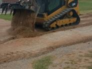 bulldozer dumping dirt